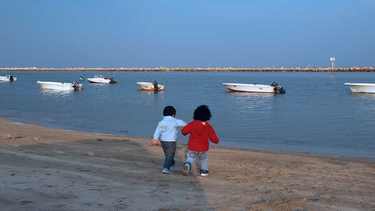 kids by the sea by Musleh Jameel