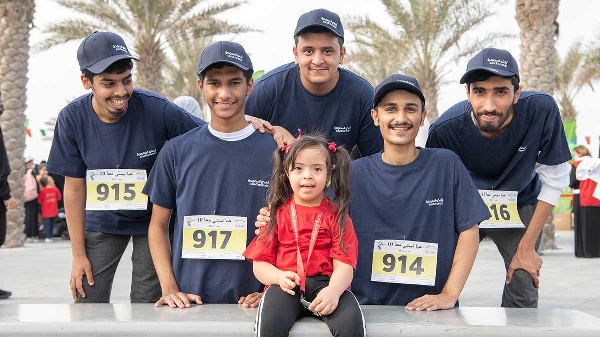 aramco trainees volunteer at special needs marathon