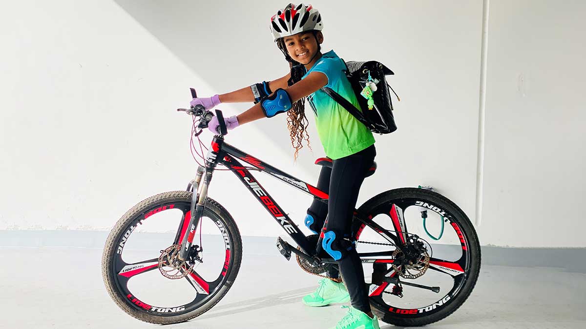 Veronica Egbe on her bicycle