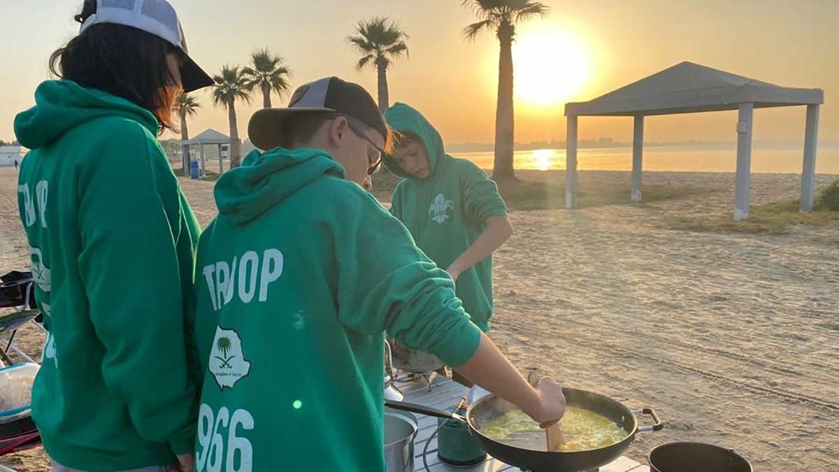 75 years of Scouts in Dhahran cooking on Half Moon Beach