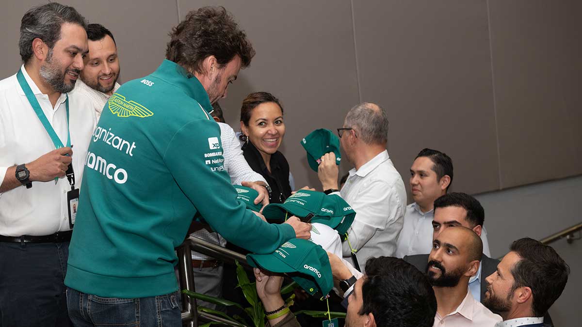 Fernando Alonso signs autographs for Aramco employees