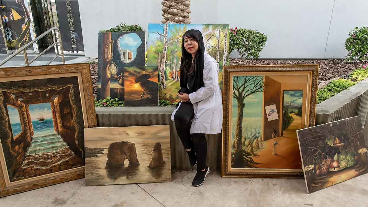 afaf salman and some of her artwork in Dhahran