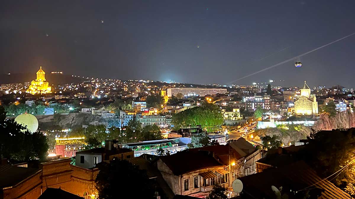 Aramcon Travel Tbilisi city at night HERO