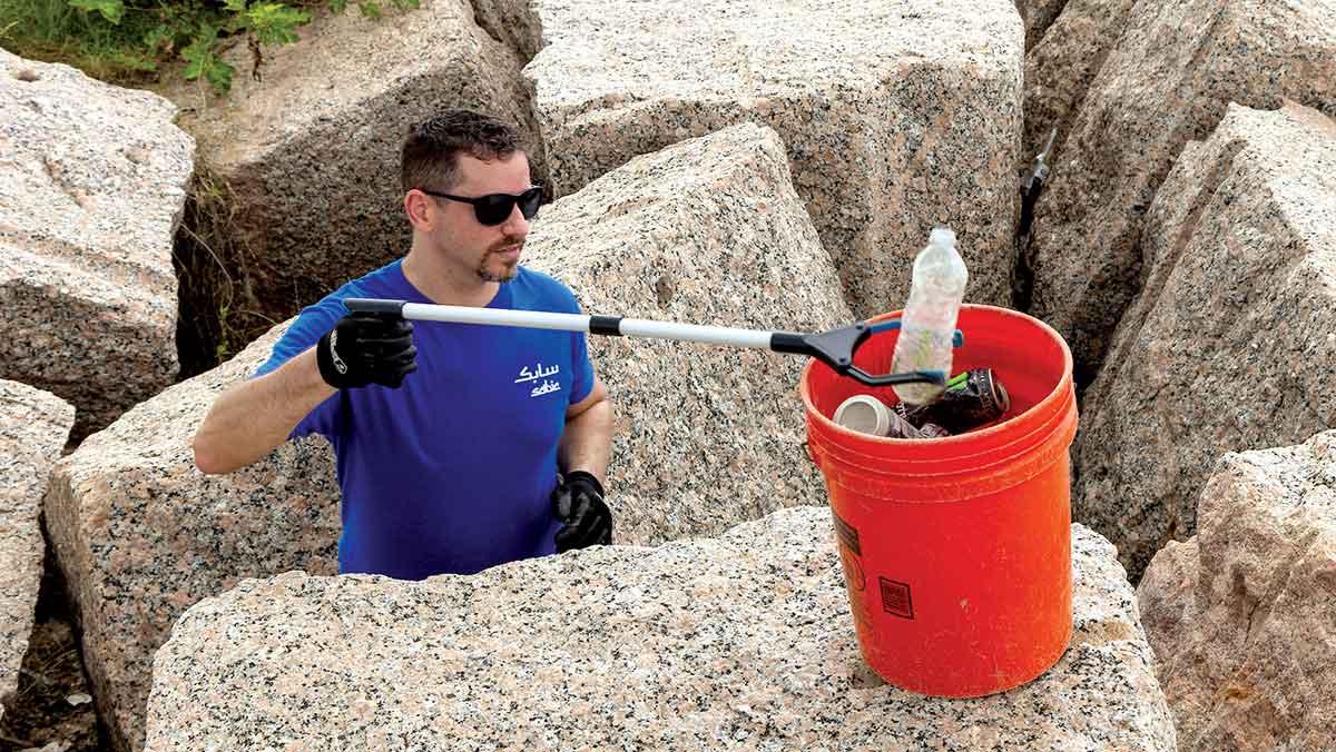 Aramco volunteers cleanup trash and plastics from Texas City Galveston Bay shoreline